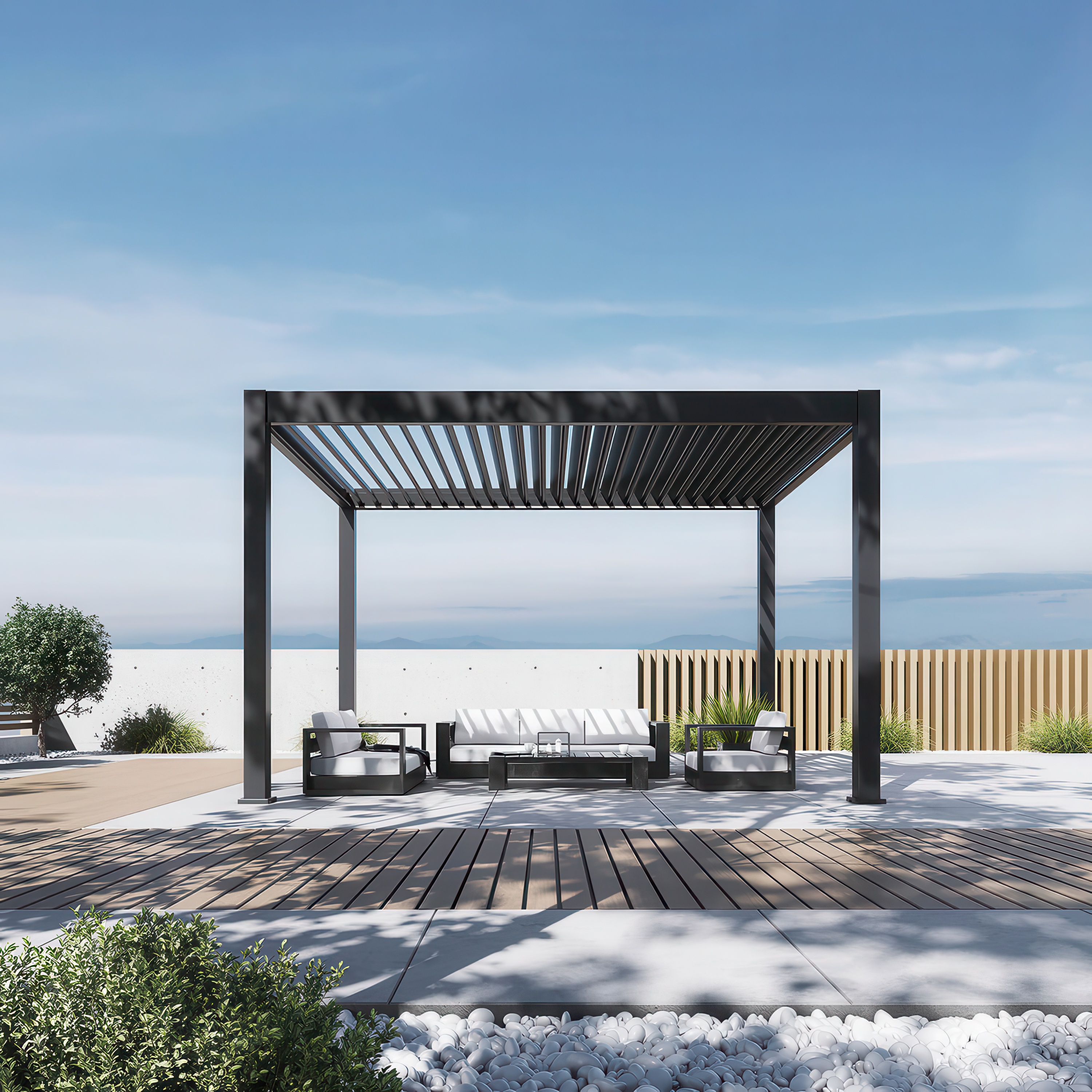 Antracitová hliníková pergola Gutroof DELUXE PRO 3x4 m s LED osvětlením na zahradní terase se sedací soupravou