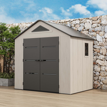Zahradní domek EVEREST 8x6 Cold Grey od HARDMAISTER na venkovní terase u kamenné zdi