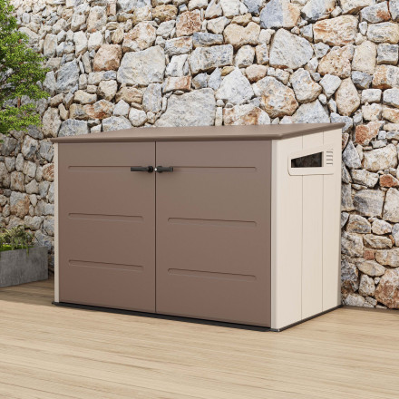 Zahradní domek TAHOMA 6.4x3.8 Brown v hnědé barvě stojící na terase u kamenné zdi
