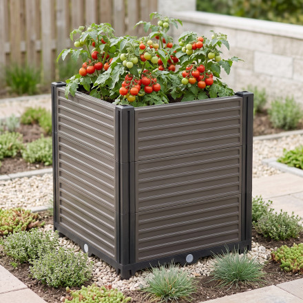 Vyvýšený záhon Pěstební box GROW BOX PLUS S od Cultivo s kvetoucími rostlinami na dřevěné terase
