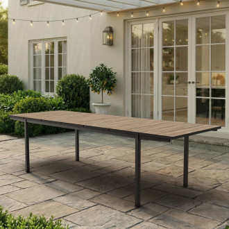 Rozkládací jídelní stůl Keter DECO PORTO NOVA 200-280 cm s černou konstrukcí a deskou v barvě Ashwood na terase